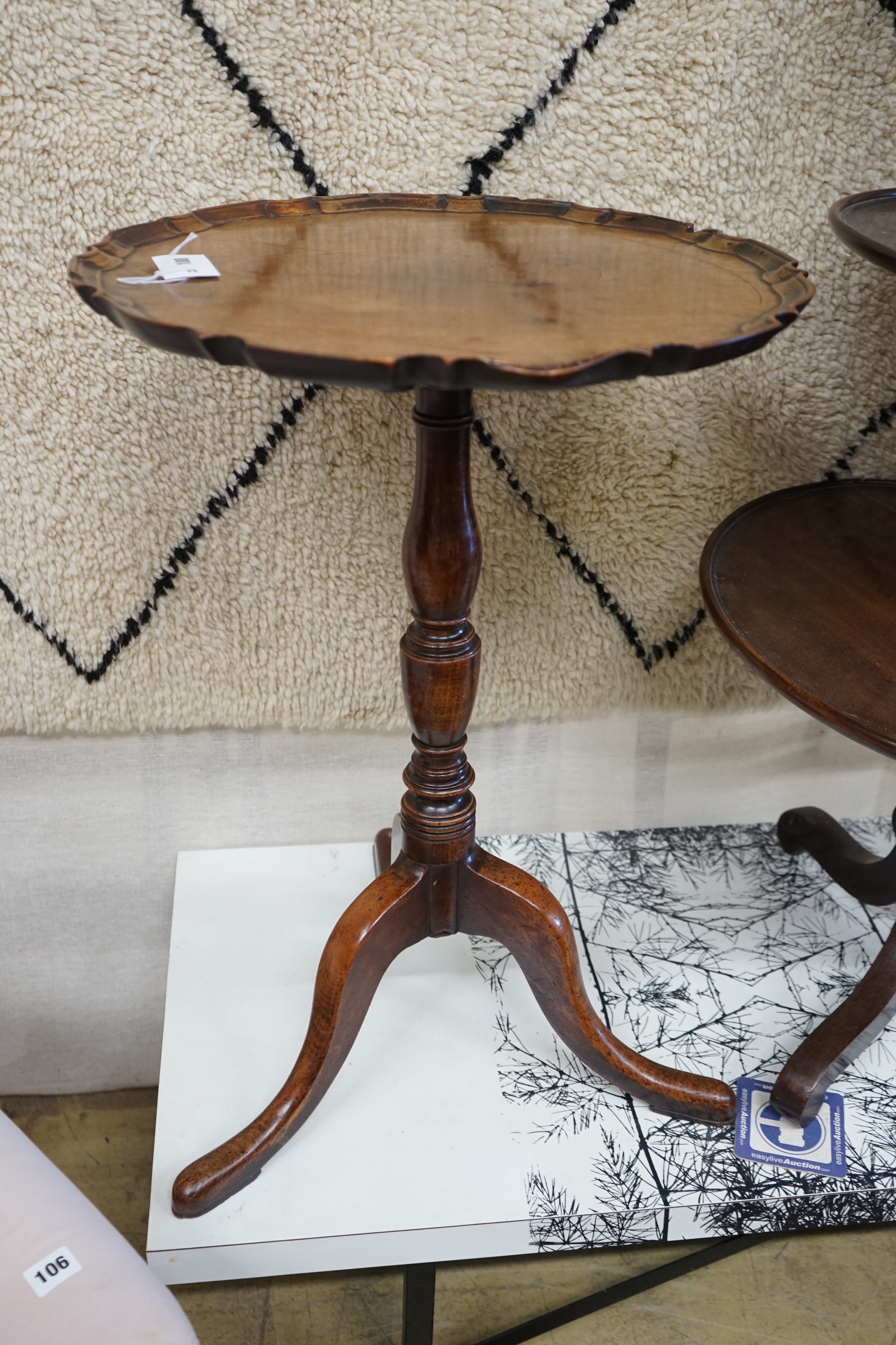 A George III mahogany circular piecrust tilt top wine table, diameter 48cm, height 72cm